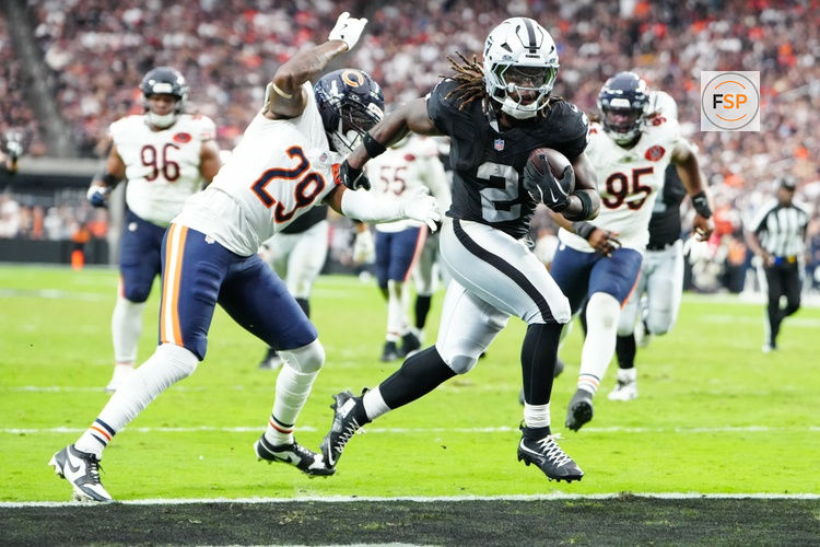 Sep 28, 2025; Paradise, Nevada, USA; Las Vegas Raiders running back Ashton Jeanty (2) runs the ball for a touchdown during the second half against the Chicago Bears at Allegiant Stadium. Credit: Stephen R. Sylvanie-Imagn Images