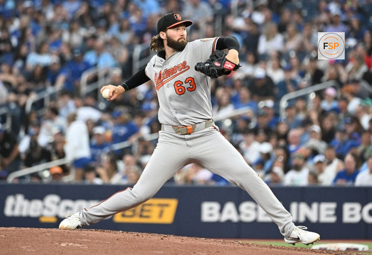 Jun 5, 2026; Toronto, Ontario, CAN;  Baltimore Orioles starting pitcher Brandon Young (63) delivers a pitch against the Toronto Blue Jays in the third inning at Rogers Centre. Credit: Dan Hamilton-Imagn Images