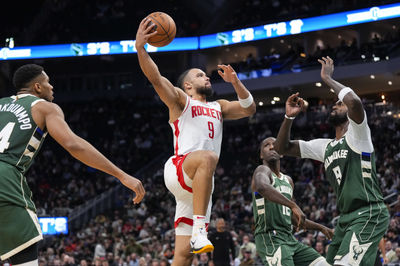 Nov 18, 2024; Milwaukee, Wisconsin, USA;  Houston Rockets forward Dillon Brooks (9) shoots during the second quarter against the Milwaukee Bucks at Fiserv Forum. Mandatory Credit: Jeff Hanisch-Imagn Images