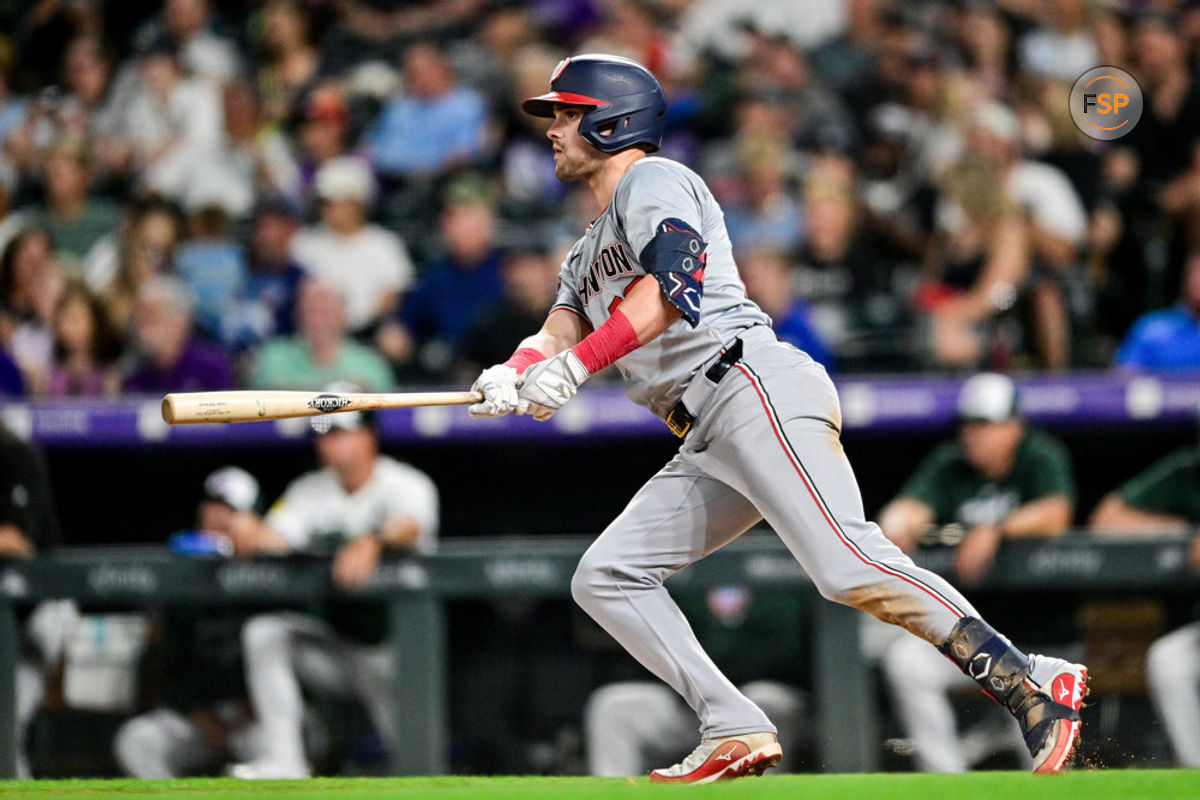 DENVER, CO - JUNE 22: Washington Nationals right fielder Lane Thomas (28) hits a seventh inning RBI single during a game between the Washington Nationals and the Colorado Rockies at Coors Field on June 22, 2024 in Denver, Colorado. (Photo by Dustin Bradford/Icon Sportswire)