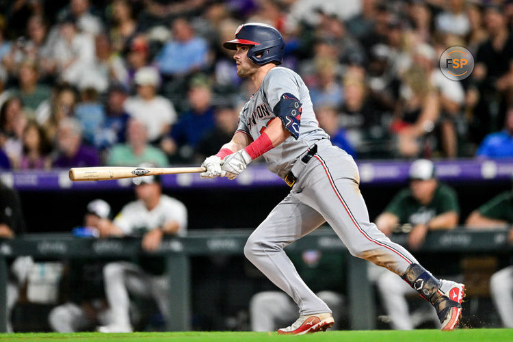 DENVER, CO - JUNE 22: Washington Nationals right fielder Lane Thomas (28) hits a seventh inning RBI single during a game between the Washington Nationals and the Colorado Rockies at Coors Field on June 22, 2024 in Denver, Colorado. (Photo by Dustin Bradford/Icon Sportswire)