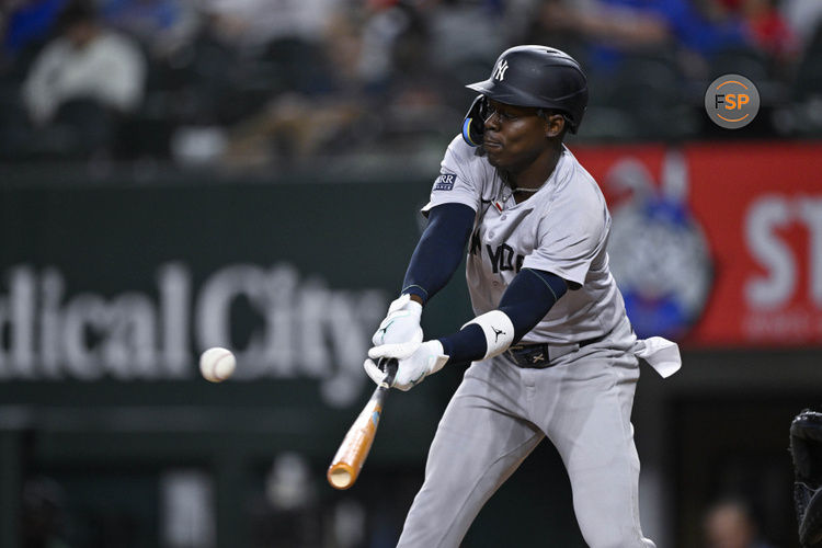 Sep 2, 2024; Arlington, Texas, USA; New York Yankees third baseman Jazz Chisholm Jr. (13) hits a single against the Texas Rangers during the eighth inning at Globe Life Field. Credit: Jerome Miron-USA TODAY Sports