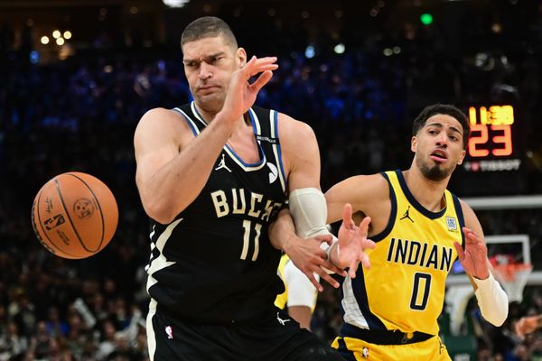 Apr 27, 2025; Milwaukee, Wisconsin, USA; Milwaukee Bucks center Brook Lopez (11) looks for a rebound against Indiana Pacers guard Tyrese Haliburton (0) in the first quarter during game four of first round for the 2024 NBA Playoffs at Fiserv Forum. Mandatory Credit: Benny Sieu-Imagn Images
