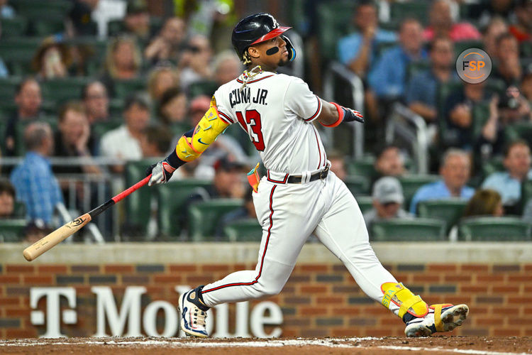 ATLANTA, GA – SEPTEMBER 18:  Atlanta right fielder Ronald Acuna Jr. (13) hits the ball deep during the MLB game between the Philadelphia Phillies and the Atlanta Braves on September 18th, 2023 at Truist Park in Atlanta, GA. (Photo by Rich von Biberstein/Icon Sportswire)