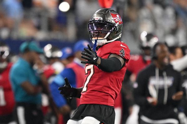 Oct 8, 2026; Arlington, Texas, USA;  Tampa Bay Buccaneers running back Bucky Irving (7) reacts after rushing the ball against Dallas Cowboys linebacker Donovan Ezeiruaku (6) at AT&T Stadium.  Mandatory Credit: Jerome Miron-Imagn Images