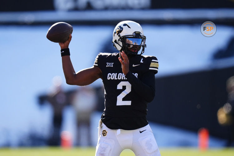 Nov 29, 2024; Boulder, Colorado, USA; Colorado Buffaloes quarterback Shedeur Sanders (2) prepares to pass the ball in the third quarter against the Oklahoma State Cowboys at Folsom Field. Credit: Ron Chenoy-Imagn Images