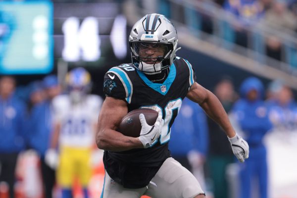 Nov 30, 2025; Charlotte, North Carolina, USA; Carolina Panthers running back Chuba Hubbard (30) rushes during the second quarter against the Los Angeles Rams at Bank of America Stadium. Mandatory Credit: Scott Kinser-Imagn Images