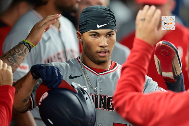 Sep 10, 2025; Miami, Florida, USA; Washington Nationals designated hitter Daylen Lile (51) celebrates after scoring against the Miami Marlins during the sixth inning at loanDepot Park. Credit: Sam Navarro-Imagn Images