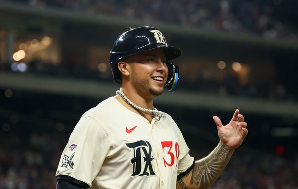 Jul 18, 2025; Arlington, Texas, USA;  Texas Rangers pinch runner Cody Freeman (39) reacts after scoring during the eighth inning against the Detroit Tigers at Globe Life Field. Mandatory Credit: Kevin Jairaj-Imagn Images