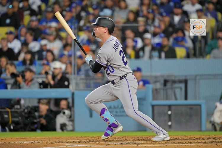 May 27, 2026; Los Angeles, California, USA; Colorado Rockies right fielder Troy Johnston (20) singles off Los Angeles Dodgers two-way player Shohei Ohtani (17) during the second inning at Dodger Stadium. Credit: Jayne Kamin-Oncea-Imagn Images