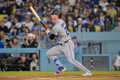 May 27, 2026; Los Angeles, California, USA; Colorado Rockies right fielder Troy Johnston (20) singles off Los Angeles Dodgers two-way player Shohei Ohtani (17) during the second inning at Dodger Stadium. Mandatory Credit: Jayne Kamin-Oncea-Imagn Images
