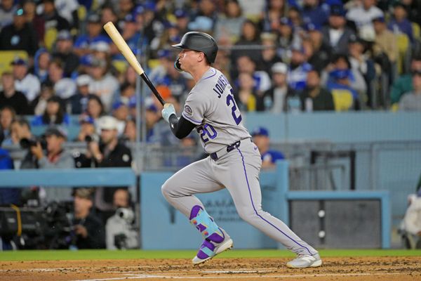 May 27, 2026; Los Angeles, California, USA; Colorado Rockies right fielder Troy Johnston (20) singles off Los Angeles Dodgers two-way player Shohei Ohtani (17) during the second inning at Dodger Stadium. Mandatory Credit: Jayne Kamin-Oncea-Imagn Images