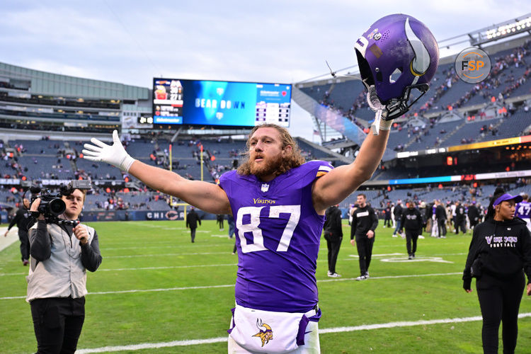 Nov 24, 2024; Chicago, Illinois, USA; Minnesota Vikings tight end T.J. Hockenson (87) celebrates after the game against the Chicago Bears at Soldier Field. Credit: Daniel Bartel-Imagn Images