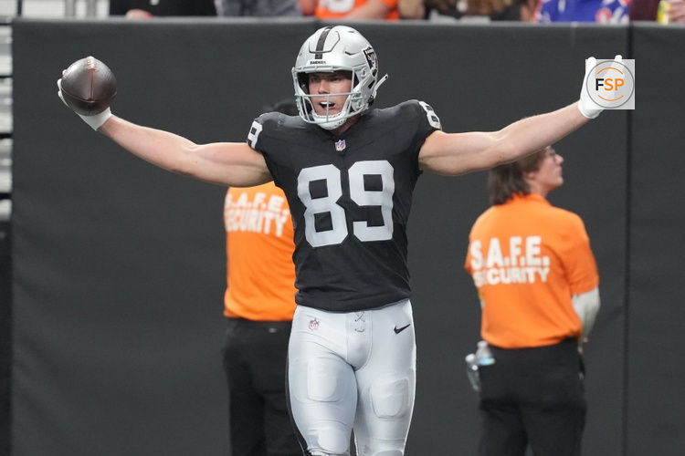 Dec 7, 2025; Paradise, Nevada, USA;  Las Vegas Raiders tight end Brock Bowers (89) reacts after catching a touchdown against the Denver Broncos during the first half at Allegiant Stadium. Credit: Kirby Lee-Imagn Images