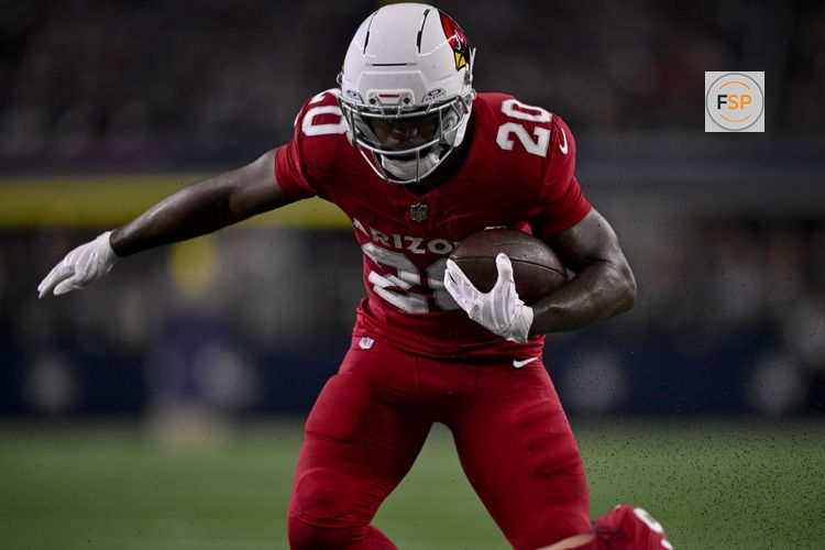 Nov 3, 2025; Arlington, Texas, USA; Arizona Cardinals running back Bam Knight (20) runs with the ball during the game between the Dallas Cowboys and the Arizona Cardinals at AT&T Stadium. Credit: Jerome Miron-Imagn Images