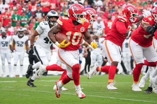 Sep 14, 2025; Kansas City, Missouri, USA; Kansas City Chiefs running back Isiah Pacheco (10) carries the ball against the Philadelphia Eagles during the third quarter of the game at GEHA Field at Arrowhead Stadium. Mandatory Credit: Denny Medley-Imagn Images