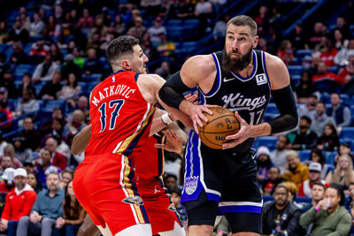 Feb 13, 2025; New Orleans, Louisiana, USA;  Sacramento Kings center Jonas Valanciunas (17) is fouled by New Orleans Pelicans center Karlo Matkovic (17) during the first half at Smoothie King Center. Mandatory Credit: Stephen Lew-Imagn Images