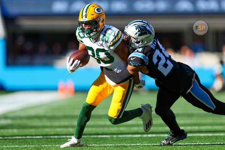 CHARLOTTE, NC - DECEMBER 24: Bo Melton #80 of the Green Bay Packers runs the ball during an NFL game against the Carolina Panthers at Bank of America Stadium on December 24, 2023 in Charlotte, NC. (Photo by David Jensen/Icon Sportswire)