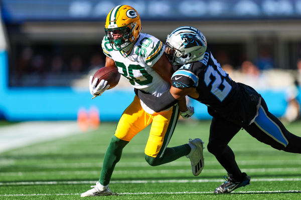 CHARLOTTE, NC - DECEMBER 24: Bo Melton #80 of the Green Bay Packers runs the ball during an NFL game against the Carolina Panthers at Bank of America Stadium on December 24, 2023 in Charlotte, NC. (Photo by David Jensen/Icon Sportswire)