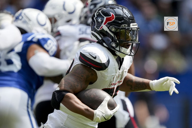 Sep 8, 2024; Indianapolis, Indiana, USA; Houston Texans running back Joe Mixon (28) rushes the ball Sunday, Sept. 8, 2024, during a game against the Indianapolis Colts at Lucas Oil Stadium. Credit: Grace Hollars/USA TODAY Network via Imagn Images