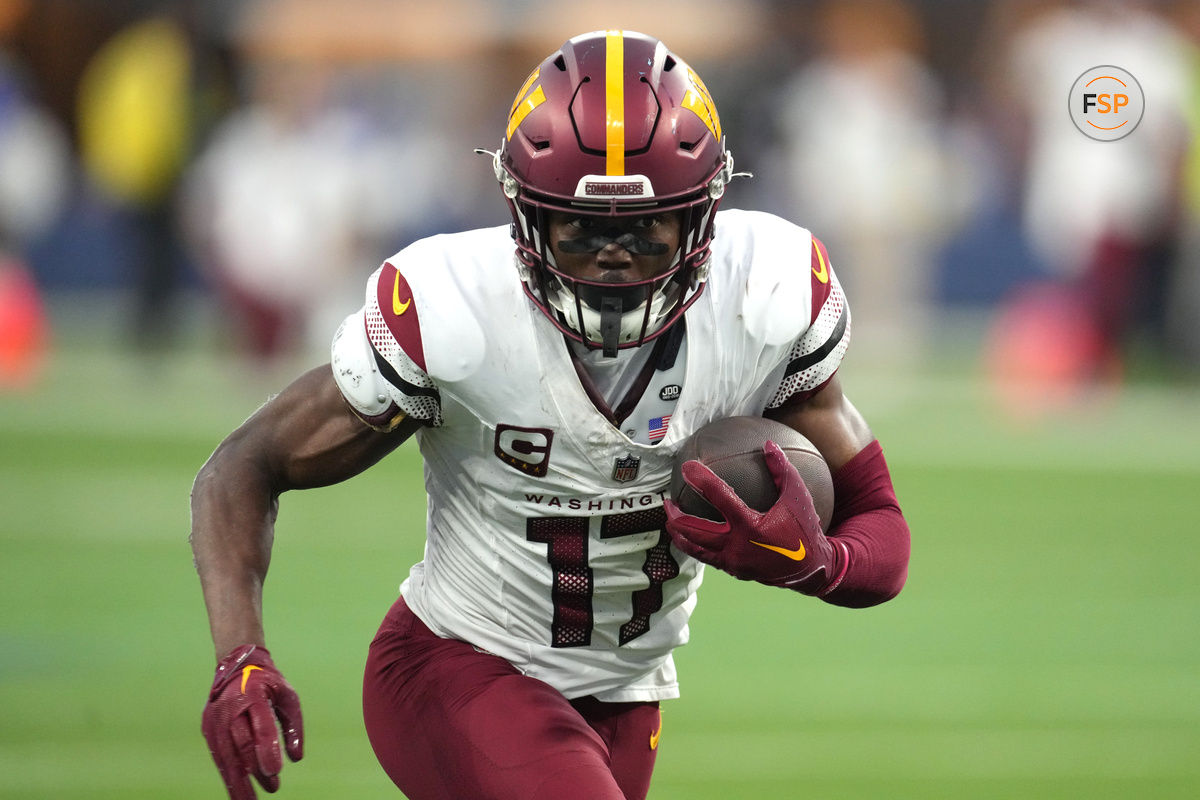 Dec 17, 2023; Inglewood, California, USA; Washington Commanders wide receiver Terry McLaurin (17) carries the ball against the Los Angeles Rams in the second half at SoFi Stadium. Credit: Kirby Lee-USA TODAY Sports