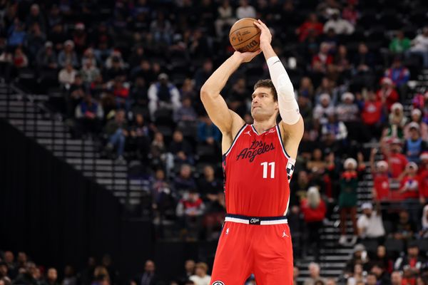 Dec 23, 2025; Inglewood, California, USA;  Los Angeles Clippers center Brook Lopez (11) shoots the ball during the first half against the Houston Rockets at Intuit Dome. Mandatory Credit: Kiyoshi Mio-Imagn Images