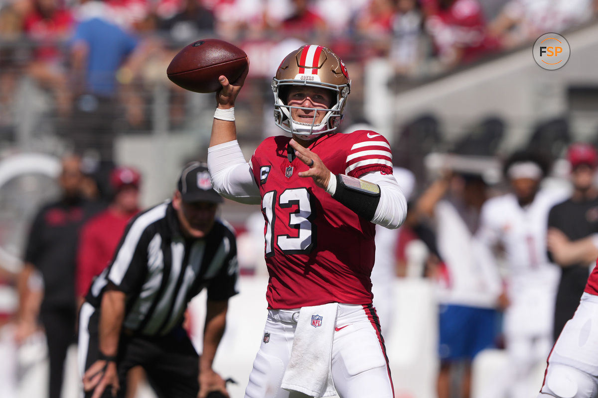 Oct 6, 2024; Santa Clara, California, USA; San Francisco 49ers quarterback Brock Purdy (13) throws a pass against the Arizona Cardinals during the first quarter at Levi's Stadium. Credit: Darren Yamashita-Imagn Images