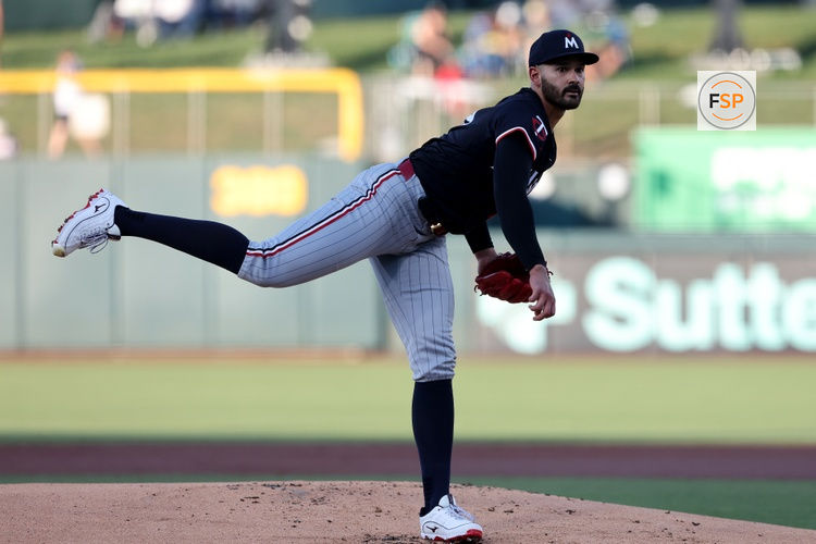 Jun 3, 2025; West Sacramento, California, USA; Minnesota Twins starting pitcher Pablo Lopez (49) throws a pitch against the Athletics during the first inning at Sutter Health Park. Credit: Dennis Lee-Imagn Images