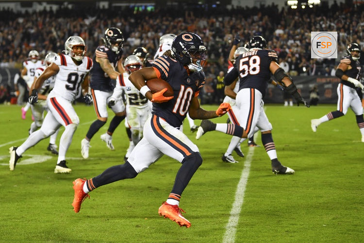 Oct 22, 2026; Chicago, Illinois, USA; Chicago Bears wide receiver Luther Burden III (10) runs for a touchdown against the New England Patriots at Soldier Field. Credit: Patrick Gorski-Imagn Images