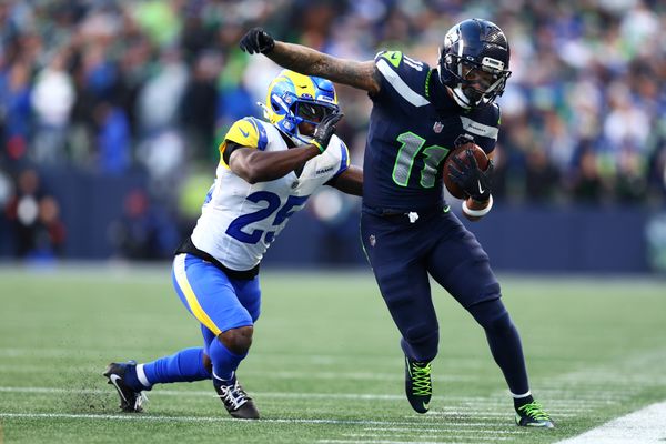 Jan 25, 2026; Seattle, WA, USA; Seattle Seahawks wide receiver Jaxon Smith-Njigba (11) runs against Los Angeles Rams cornerback Roger McCreary (25) during the first half in the 2026 NFC Championship Game at Lumen Field. Mandatory Credit: Kevin Ng-Imagn Images