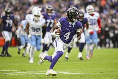 Oct 4, 2026; Baltimore, Maryland, USA;    Baltimore Ravens wide receiver Zay Flowers (4) runs after a catch for a first half touchdown against the Tennessee Titans at M&T Bank Stadium. Mandatory Credit: Tommy Gilligan-Imagn Images