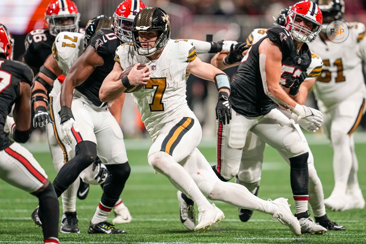 Nov 26, 2023; Atlanta, Georgia, USA; New Orleans Saints quarterback Taysom Hill (7) runs against the Atlanta Falcons during the second half at Mercedes-Benz Stadium. Credit: Dale Zanine-USA TODAY Sports