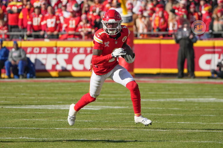 Dec 21, 2024; Kansas City, Missouri, USA; Kansas City Chiefs wide receiver Xavier Worthy (1) runs the ball against the Houston Texans during the first half at GEHA Field at Arrowhead Stadium. Credit: Denny Medley-Imagn Images