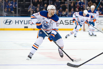 Mar 16, 2025; New York, New York, USA; Edmonton Oilers center Connor McDavid (97) skates against the New York Rangers during the third period at Madison Square Garden. Mandatory Credit: Danny Wild-Imagn Images