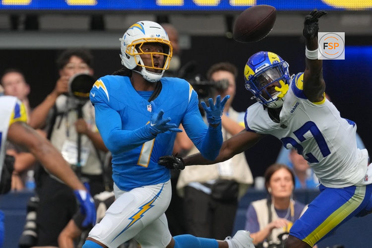 Aug 16, 2025; Inglewood, California, USA; Los Angeles Chargers wide receiver Quentin Johnston (1) attempts to make a catch against Los Angeles Rams cornerback A.J. Green (27) in the first half at SoFi Stadium. Credit: Kirby Lee-Imagn Images