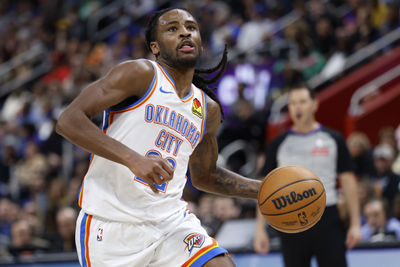 Mar 15, 2025; Detroit, Michigan, USA;  Oklahoma City Thunder guard Cason Wallace (22) dribbles in the second half against the Detroit Pistons at Little Caesars Arena. Mandatory Credit: Rick Osentoski-Imagn Images