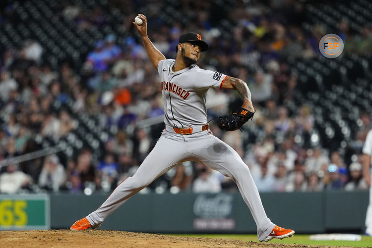 Jun 11, 2025; Denver, Colorado, USA; San Francisco Giants relief pitcher Camilo Doval (75)  delivers a pitch in the ninth inning against the Colorado Rockies at Coors Field. Credit: Ron Chenoy-Imagn Images
