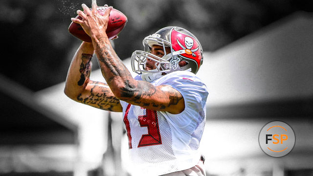 Aug 6, 2015; Tampa Bay, FL, USA; Tampa Bay Buccaneers wide receiver Mike Evans (13) catches the ball as he works out during training camp at One Buc Place. Mandatory Credit: Kim Klement-USA TODAY Sports