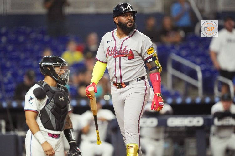 Aug 25, 2025; Miami, Florida, USA;  Atlanta Braves designated hitter Marcell Ozuna (20) strikes out looking in the ninth inning against the Miami Marlins at loanDepot Park. Credit: Jim Rassol-Imagn Images