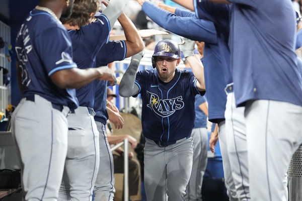 MIAMI, FL - JUNE 04: Tampa Bay Rays second base Brandon Lowe (8) runs the dugout gauntlet after hitting a homer int he fourth inning during the game between the Tampa Bay Rays and the Miami Marlins on Tuesday, June 4, 2024 at LoanDepot Park in Miami, Fla. (Photo by Peter Joneleit/Icon Sportswire)