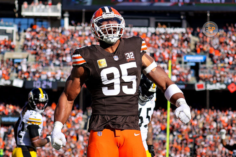 CLEVELAND, OH - NOVEMBER 19: Cleveland Browns defensive end Myles Garrett (95) reacts after sacking Pittsburgh Steelers quarterback Kenny Pickett (8) (not pictured) inside the 1-yard line during the first quarter of the National Football League game between the Pittsburgh Steelers and Cleveland Browns on November 19, 2023, at Cleveland Browns Stadium in Cleveland, OH. (Photo by Frank Jansky/Icon Sportswire)