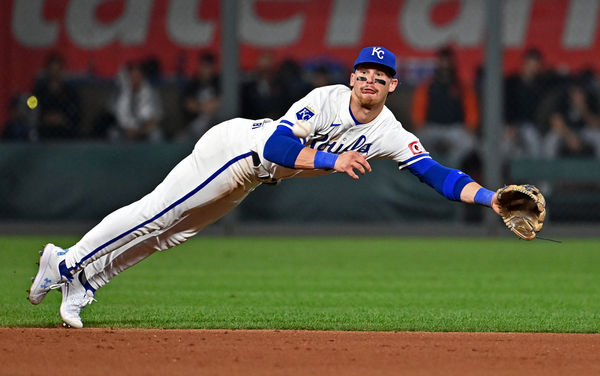 Sep 18, 2024; Kansas City, Missouri, USA;  Kansas City Royals shortstop Bobby Witt Jr. (7) dives for the ball in the seventh inning against the Detroit Tigers at Kauffman Stadium. Mandatory Credit: Peter Aiken-Imagn Images