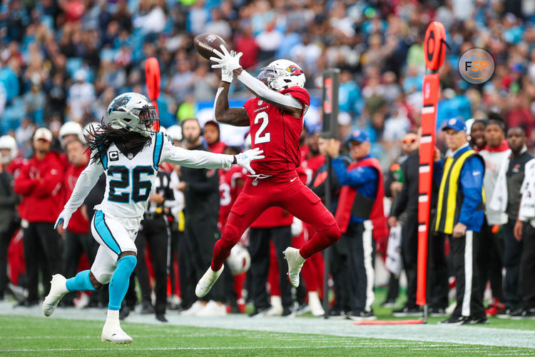 CHARLOTTE, NC - OCTOBER 02: Marquise Brown (2) of the Arizona Cardinals makes a catch over Donte Jackson (26) of the Carolina Panthers during a football game between the Carolina Panthers and the Arizona Cardinals on October 2, 2022, at Bank of America Stadium in Charlotte, NC. (Photo by David Jensen/Icon Sportswire)