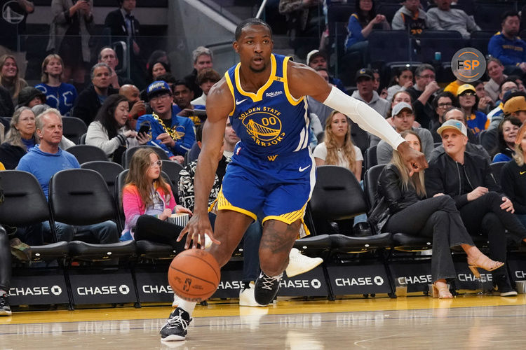 Jan 4, 2025; San Francisco, California, USA;  Golden State Warriors forward Jonathan Kuminga (00) drives to the basket against the Memphis Grizzlies in the second quarter at Chase Center. Credit: David Gonzales-Imagn Images