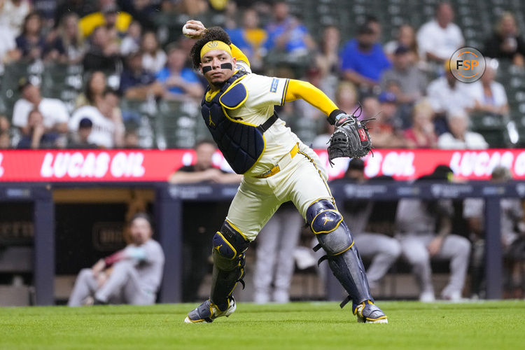 Sep 19, 2024; Milwaukee, Wisconsin, USA;  Milwaukee Brewers catcher William Contreras (24) throws to first base during the fourth inning against the Arizona Diamondbacks  at American Family Field. Credit: Jeff Hanisch-Imagn Images