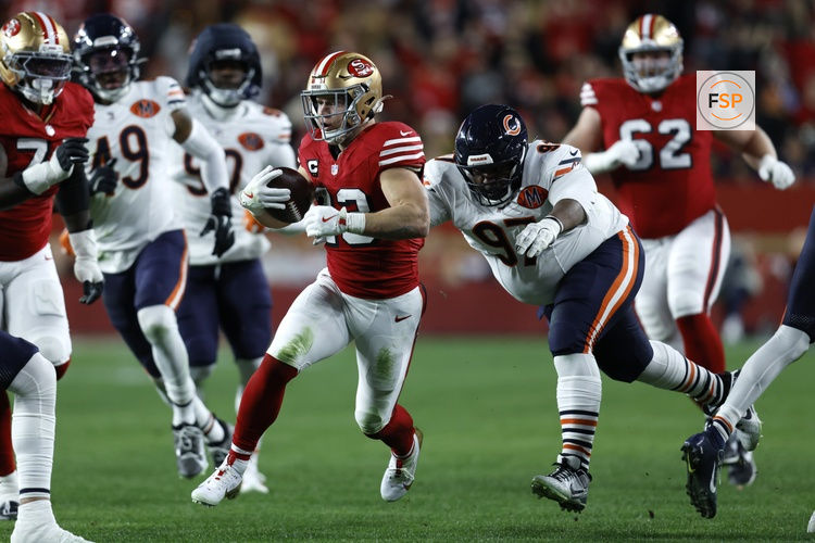 Dec 28, 2025; Santa Clara, California, USA; San Francisco 49ers running back Christian McCaffrey (23) runs against Chicago Bears defensive tackle Andrew Billings (97) in the first half at Levi's Stadium. Credit: Sergio Estrada-Imagn Images