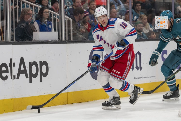 Jan 23, 2026; San Jose, California, USA;  New York Rangers left wing Artemi Panarin (10) looks to pass the puck during the third period against the San Jose Sharks at SAP Center at San Jose. Credit: Stan Szeto-Imagn Images