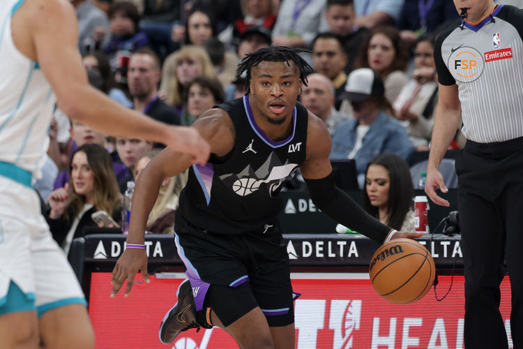 Jan 15, 2025; Salt Lake City, Utah, USA;  Utah Jazz guard Isaiah Collier (13) dribbles during the second half against the Charlotte Hornets at Delta Center. Credit: Chris Nicoll-Imagn Images