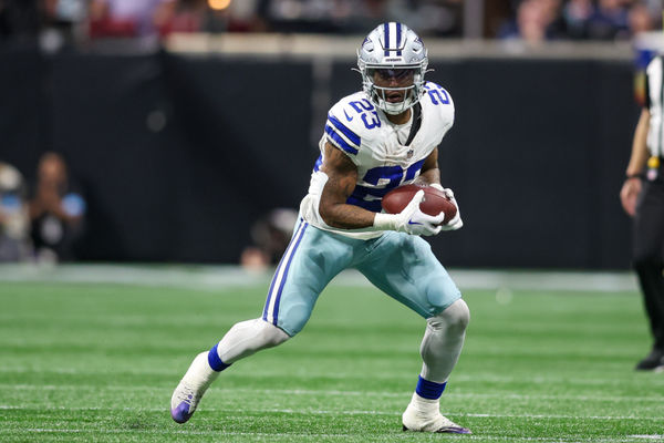 Nov 3, 2024; Atlanta, Georgia, USA; Dallas Cowboys running back Rico Dowdle (23) runs after a catch against the Atlanta Falcons in the fourth quarter at Mercedes-Benz Stadium. Mandatory Credit: Brett Davis-Imagn Images