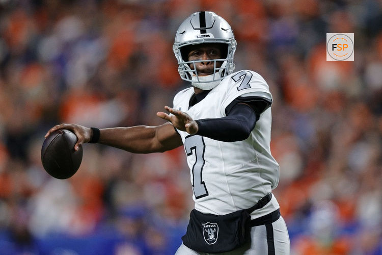 Nov 6, 2025; Denver, Colorado, USA; Las Vegas Raiders quarterback Geno Smith (7) drops back to pass against the Denver Broncos during the first half at Empower Field at Mile High. Credit: Isaiah J. Downing-Imagn Images